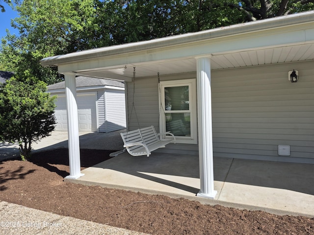 810 Packard Ave, Louisville, KY 40217 - view of patio / terrace featuring an outbuilding