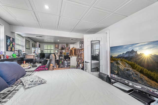 bedroom with an office area