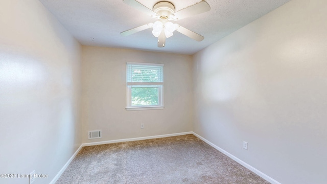 unfurnished room with carpet, baseboards, and ceiling fan