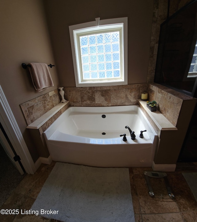 bathroom featuring a bath