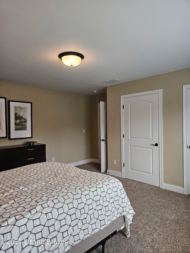 905 Fossil Creek Cir, Louisville, KY 40245 - bedroom with carpet floors and baseboards