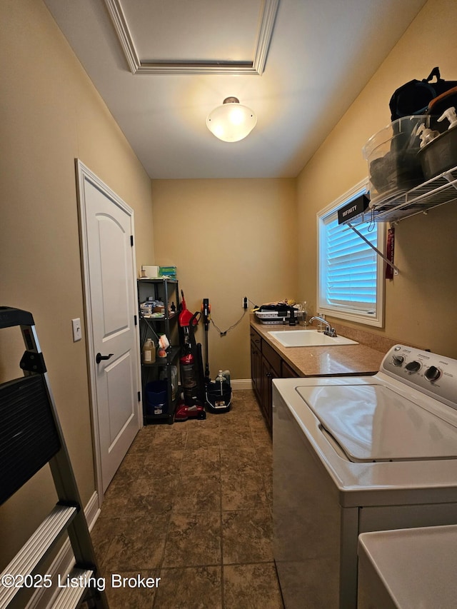 905 Fossil Creek Cir, Louisville, KY 40245 - washroom with cabinet space, washing machine and dryer, and baseboards