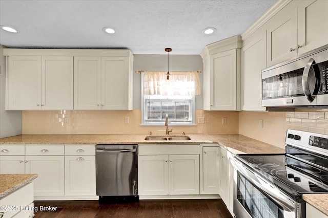 7208 Iron Gate Ct, Louisville, KY 40241 - kitchen with appliances with stainless steel finishes, a sink, dark wood-style floors, recessed lighting, and backsplash