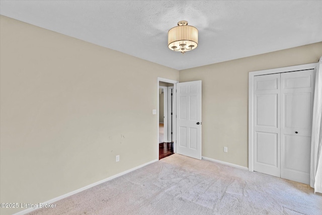 7208 Iron Gate Ct, Louisville, KY 40241 - unfurnished bedroom with baseboards, carpet, and a closet