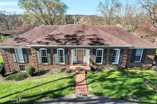7208 Iron Gate Ct, Louisville, KY 40241 - view of front of property featuring brick siding, a front lawn, a chimney, and a shingled roof