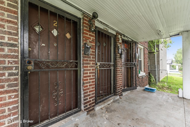 1724 W Ormsby Ave, Louisville, KY 40210 - entrance to property featuring brick siding and covered porch