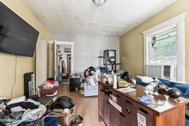 1724 W Ormsby Ave, Louisville, KY 40210 - office featuring wood finished floors, a textured ceiling, and cooling unit