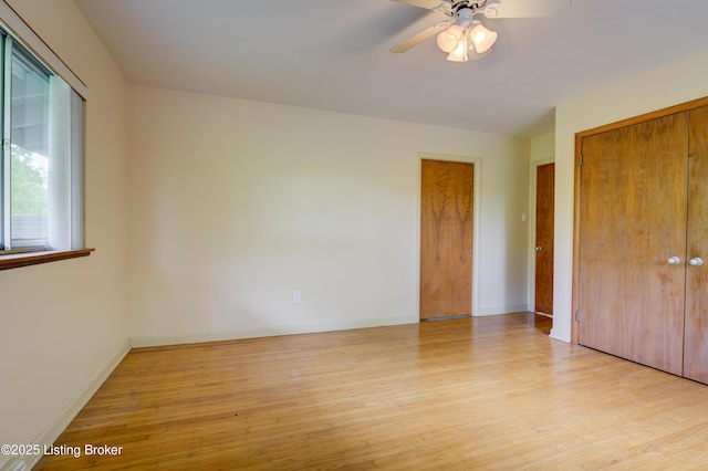9113 Darley Dr, Louisville, KY 40241 - unfurnished bedroom with light wood-type flooring, baseboards, and a ceiling fan