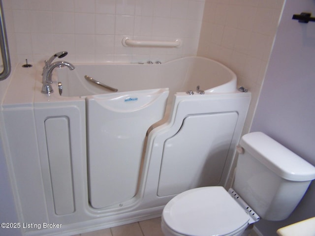 1411 Amberlin Ln, Louisville, KY 40245 - bathroom with a tub, tile patterned flooring, and toilet