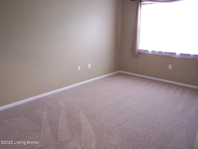 1411 Amberlin Ln, Louisville, KY 40245 - carpeted spare room with baseboards
