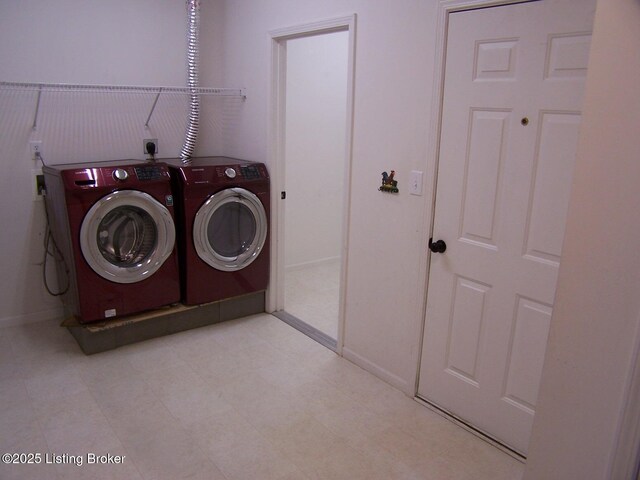 1411 Amberlin Ln, Louisville, KY 40245 - clothes washing area with washing machine and dryer and baseboards