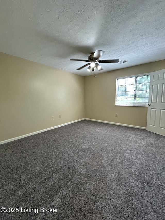 8411 Ambrosse Ln Unit 104, Louisville, KY 40299 - spare room with ceiling fan, baseboards, a textured ceiling, and dark colored carpet