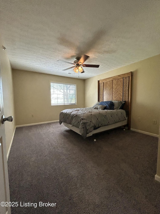 8411 Ambrosse Ln Unit 104, Louisville, KY 40299 - bedroom featuring a textured ceiling, dark colored carpet, ceiling fan, and baseboards