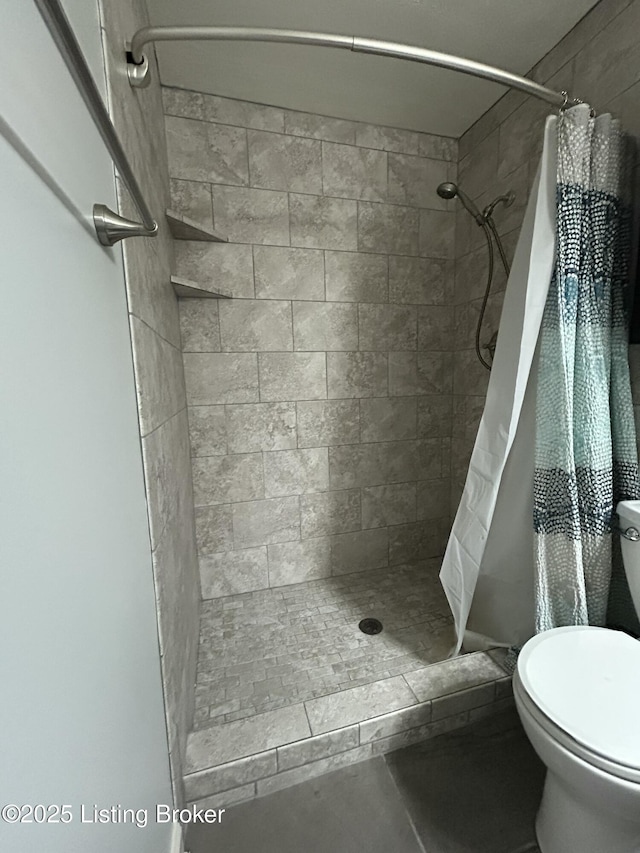 8411 Ambrosse Ln Unit 104, Louisville, KY 40299 - bathroom featuring toilet and a shower stall