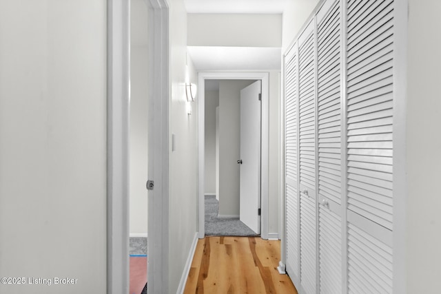 7605 Randy Ct, Louisville, KY 40258 - corridor featuring light wood finished floors and baseboards