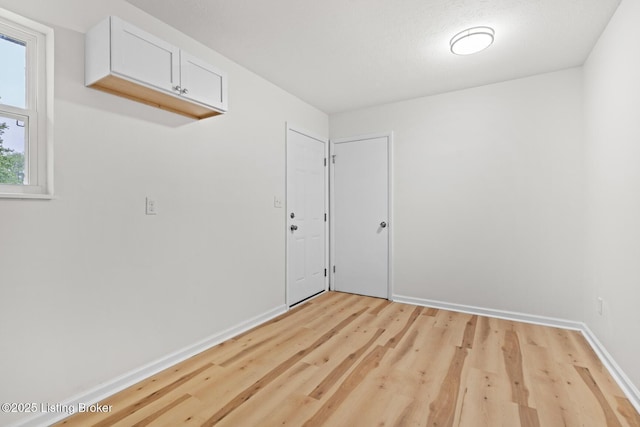 7605 Randy Ct, Louisville, KY 40258 - spare room featuring light wood-type flooring and baseboards