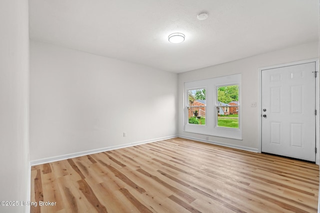 7605 Randy Ct, Louisville, KY 40258 - spare room with light wood-style floors, baseboards, and a smoke detector