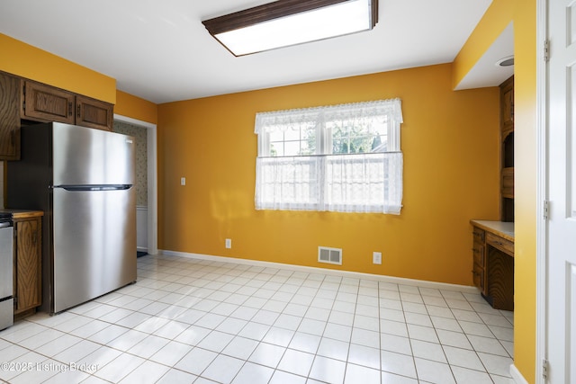 12100 Edenwood Dr, Louisville, KY 40243 - kitchen with freestanding refrigerator and baseboards