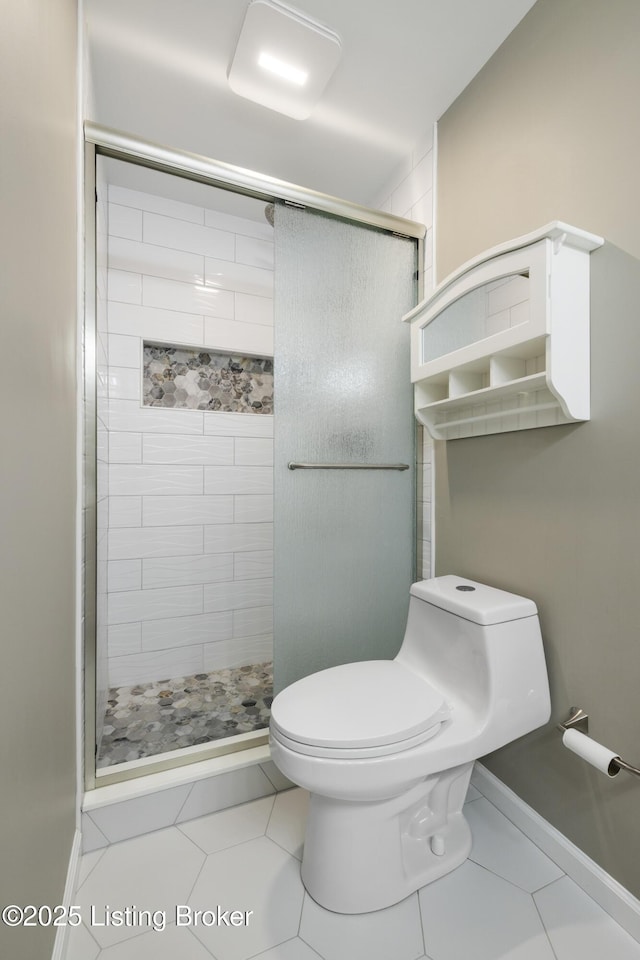 12100 Edenwood Dr, Louisville, KY 40243 - bathroom featuring a shower stall, toilet, and tile patterned floors