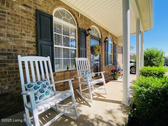 view of patio featuring a porch