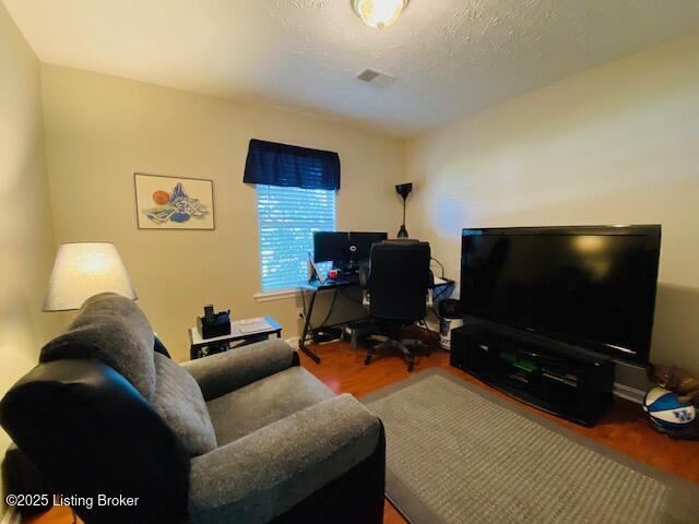 home office featuring wood finished floors