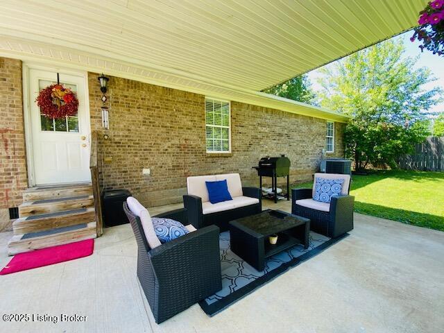 view of patio / terrace featuring outdoor lounge area and grilling area