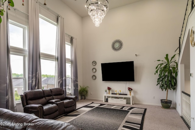 15803 Stonehouse Ct, Louisville, KY 40245 - living area with carpet, a chandelier, and a high ceiling