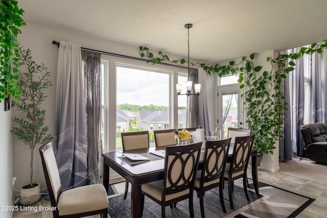 15803 Stonehouse Ct, Louisville, KY 40245 - dining space with a chandelier