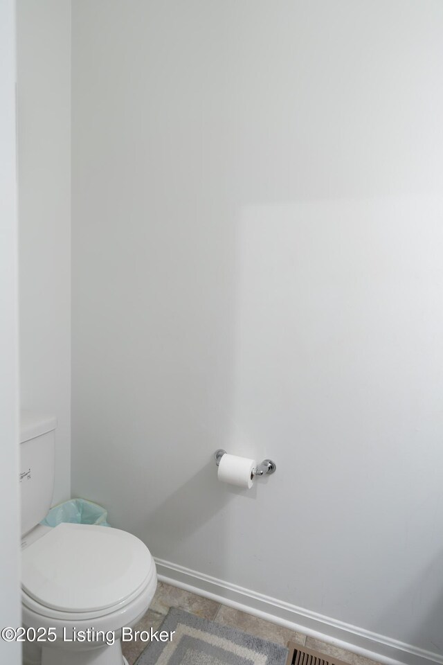 15803 Stonehouse Ct, Louisville, KY 40245 - bathroom with baseboards and toilet