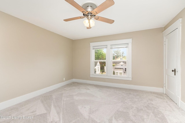 835 Sylvia St, Louisville, KY 40217 - unfurnished room with light carpet, baseboards, and ceiling fan