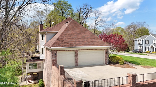 7006 Breakwater Pl, Prospect, KY 40059 - view of side of property featuring a chimney, driveway, a shingled roof, stairs, and brick siding