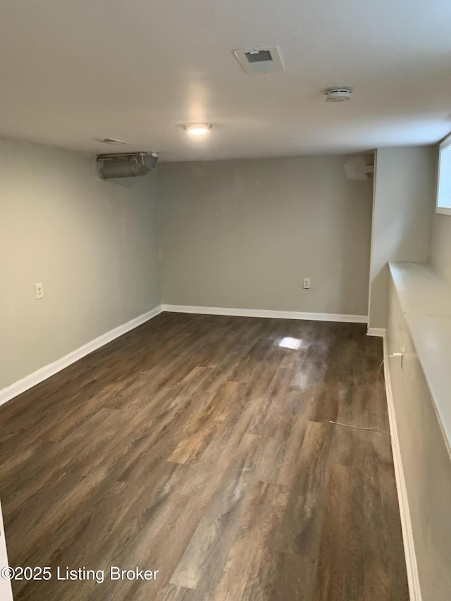 2532 Garland Ave, Louisville, KY 40211 - below grade area featuring dark wood-style flooring and baseboards