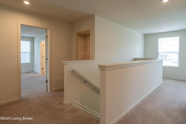 7618 Fair Ln, Louisville, KY 40291 - corridor featuring an upstairs landing, light carpet, recessed lighting, and baseboards