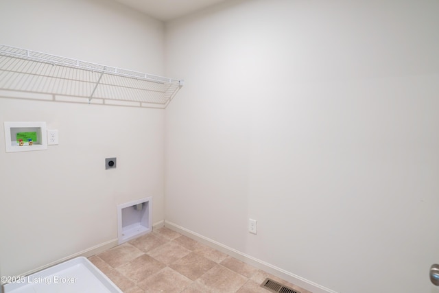 7618 Fair Ln, Louisville, KY 40291 - washroom with hookup for an electric dryer, washer hookup, and baseboards