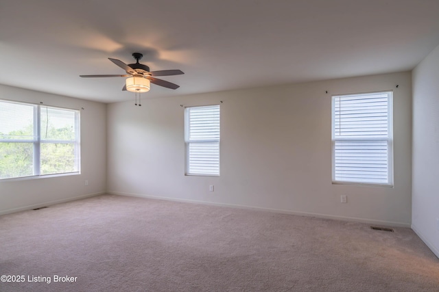 7618 Fair Ln, Louisville, KY 40291 - spare room featuring light colored carpet, baseboards, and ceiling fan