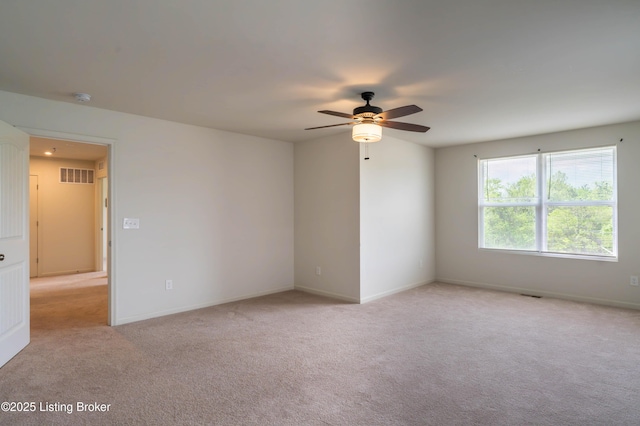 7618 Fair Ln, Louisville, KY 40291 - spare room with a ceiling fan, light colored carpet, a smoke detector, and baseboards
