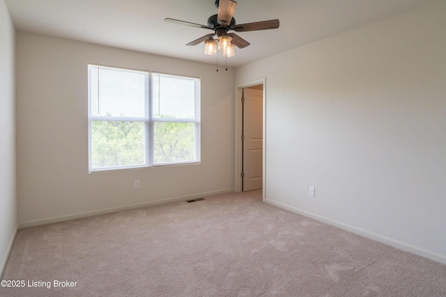 7618 Fair Ln, Louisville, KY 40291 - unfurnished room featuring baseboards, light colored carpet, and a ceiling fan