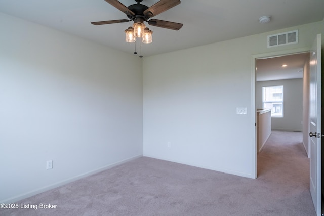 7618 Fair Ln, Louisville, KY 40291 - carpeted empty room with ceiling fan, a smoke detector, and baseboards