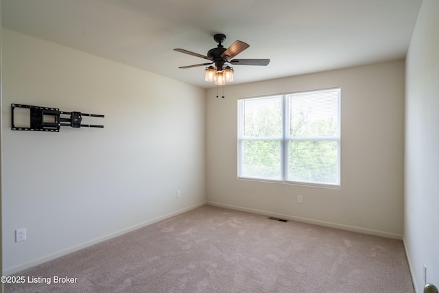 7618 Fair Ln, Louisville, KY 40291 - carpeted spare room featuring a ceiling fan and baseboards