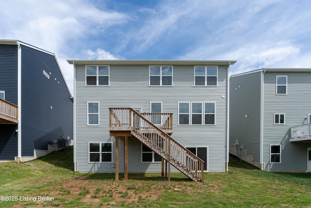 7618 Fair Ln, Louisville, KY 40291 - rear view of house with stairs, a wooden deck, a yard, and central air condition unit