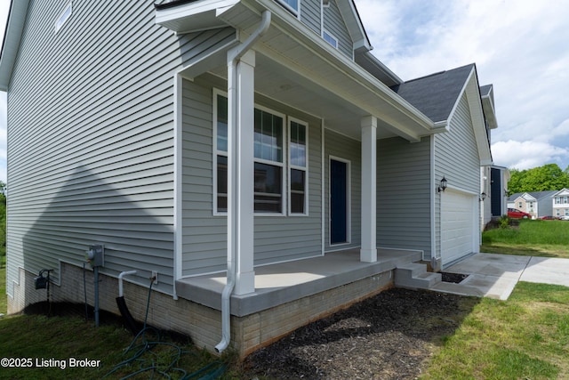 7618 Fair Ln, Louisville, KY 40291 - view of side of home featuring a porch, concrete driveway, and an attached garage