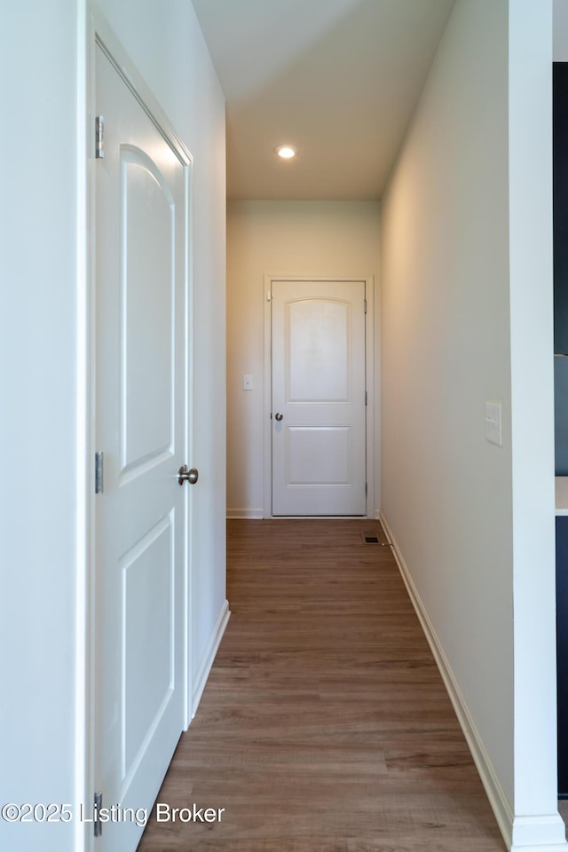 7618 Fair Ln, Louisville, KY 40291 - hall with wood finished floors, baseboards, and recessed lighting
