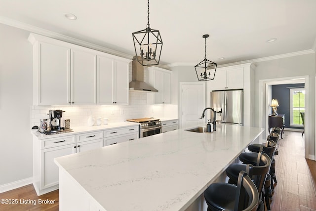 3403 Heather Wood Dr, La Grange, KY 40031 - kitchen with stainless steel appliances, wall chimney exhaust hood, a sink, dark wood-style floors, and a center island with sink