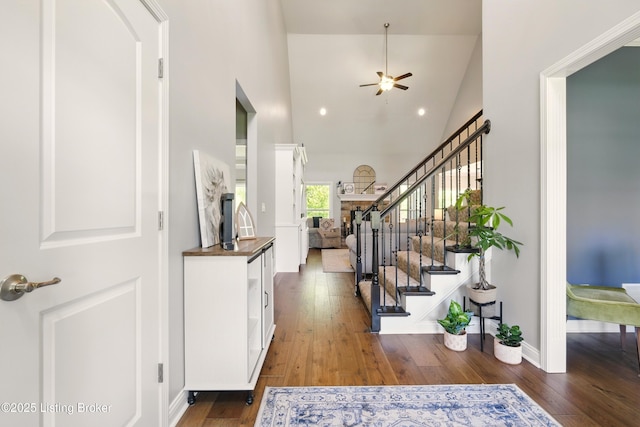 3403 Heather Wood Dr, La Grange, KY 40031 - entrance foyer featuring ceiling fan, high vaulted ceiling, wood finished floors, stairway, and baseboards