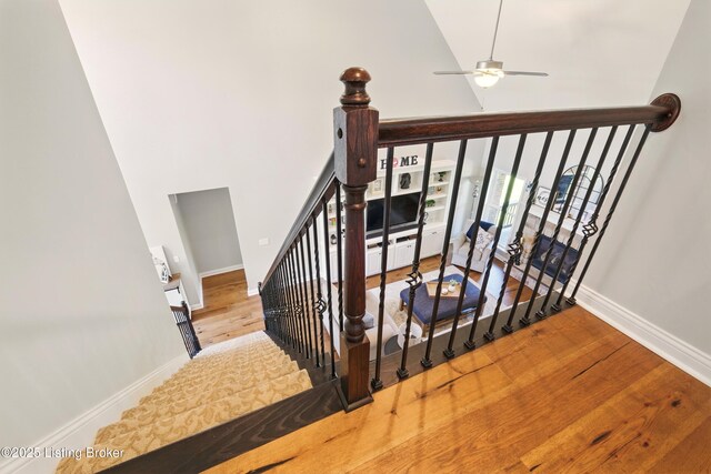 3403 Heather Wood Dr, La Grange, KY 40031 - staircase with high vaulted ceiling, baseboards, a ceiling fan, and wood finished floors