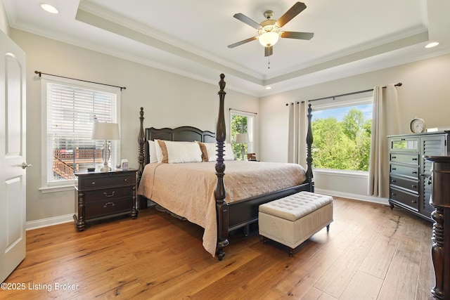 3403 Heather Wood Dr, La Grange, KY 40031 - bedroom featuring a raised ceiling, multiple windows, hardwood / wood-style floors, ornamental molding, and recessed lighting
