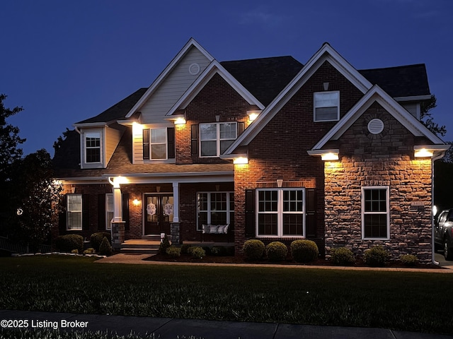 3403 Heather Wood Dr, La Grange, KY 40031 - craftsman house with a yard, covered porch, stone siding, and brick siding