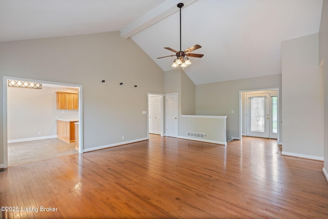 1613 E Crystal Dr, La Grange, KY 40031 - unfurnished living room featuring high vaulted ceiling, ceiling fan, beam ceiling, light wood-style flooring, and baseboards
