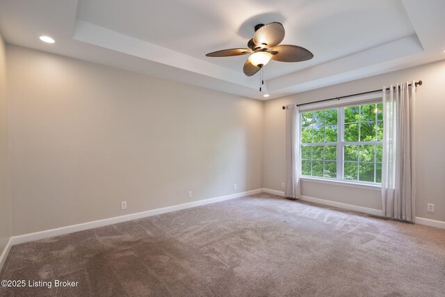 1613 E Crystal Dr, La Grange, KY 40031 - carpeted empty room with a raised ceiling, ceiling fan, baseboards, and recessed lighting