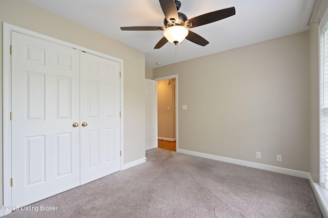 1613 E Crystal Dr, La Grange, KY 40031 - unfurnished bedroom with carpet, a closet, baseboards, and a ceiling fan